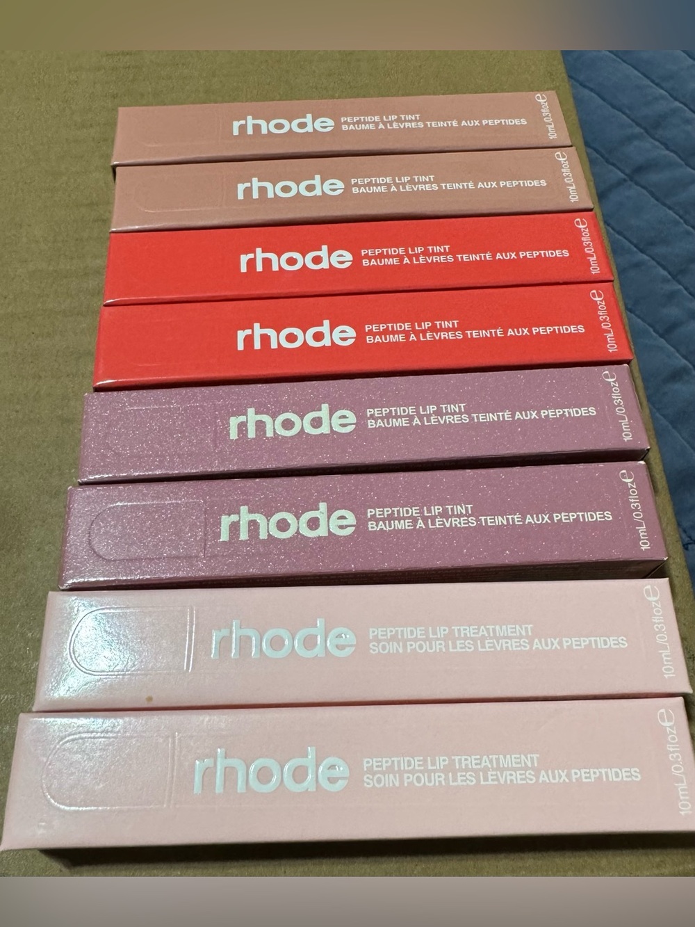 RHODE Peptide Lip Tints, $18/gloss NIB